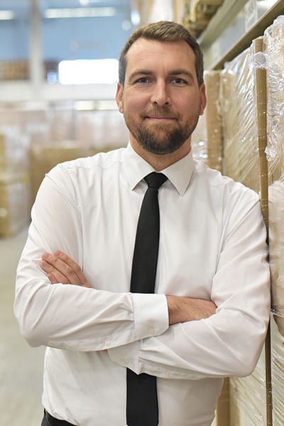 CEO in warehouse